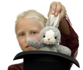 Child Pulling Stuffed Rabbit from a Hat